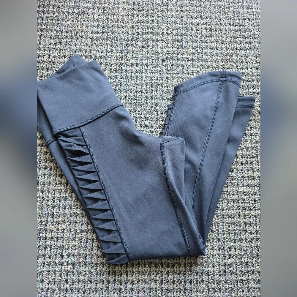 Lululemon Athletica Black Capris with Mesh Accents